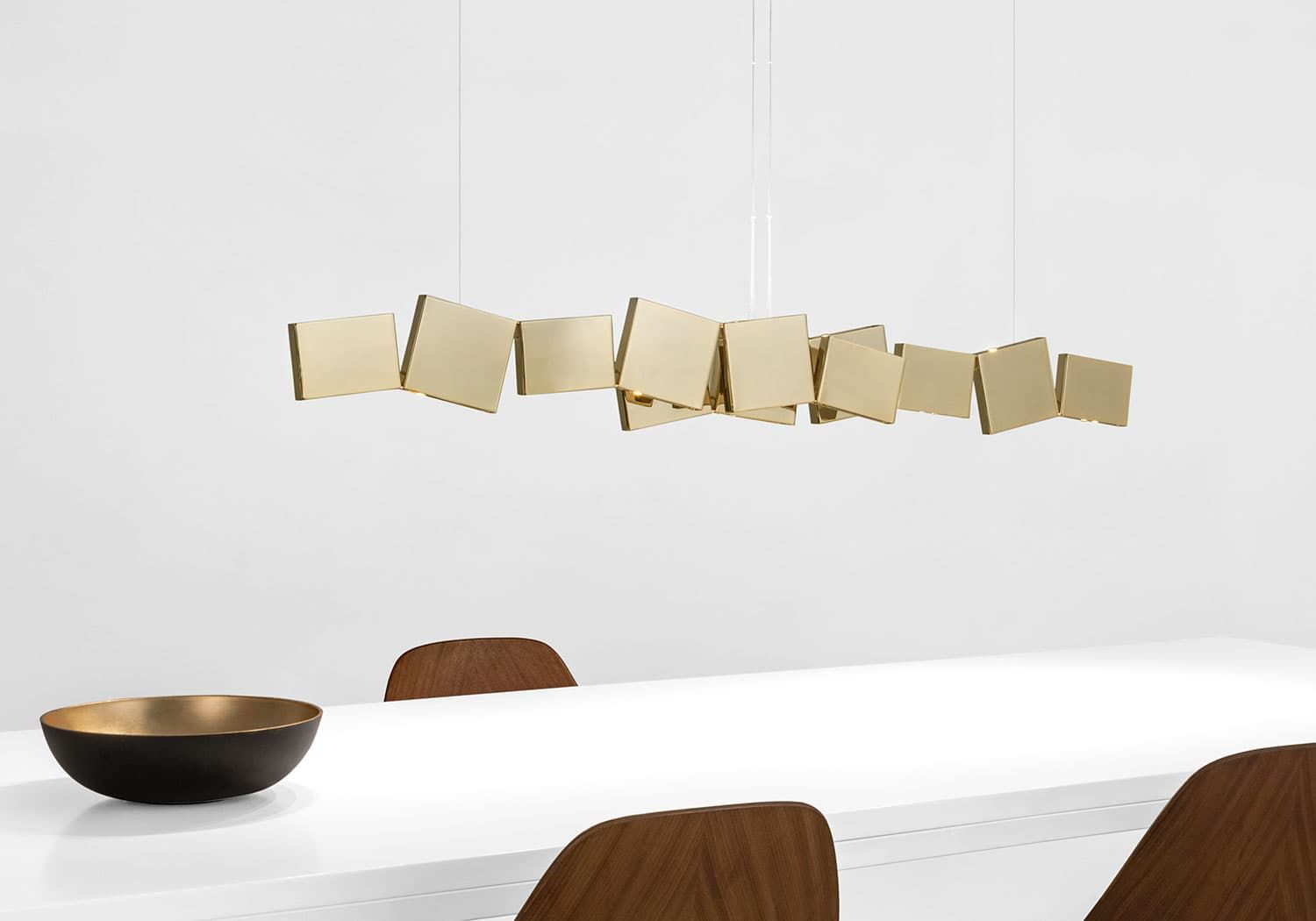 Terzani lamp on top of a long table
